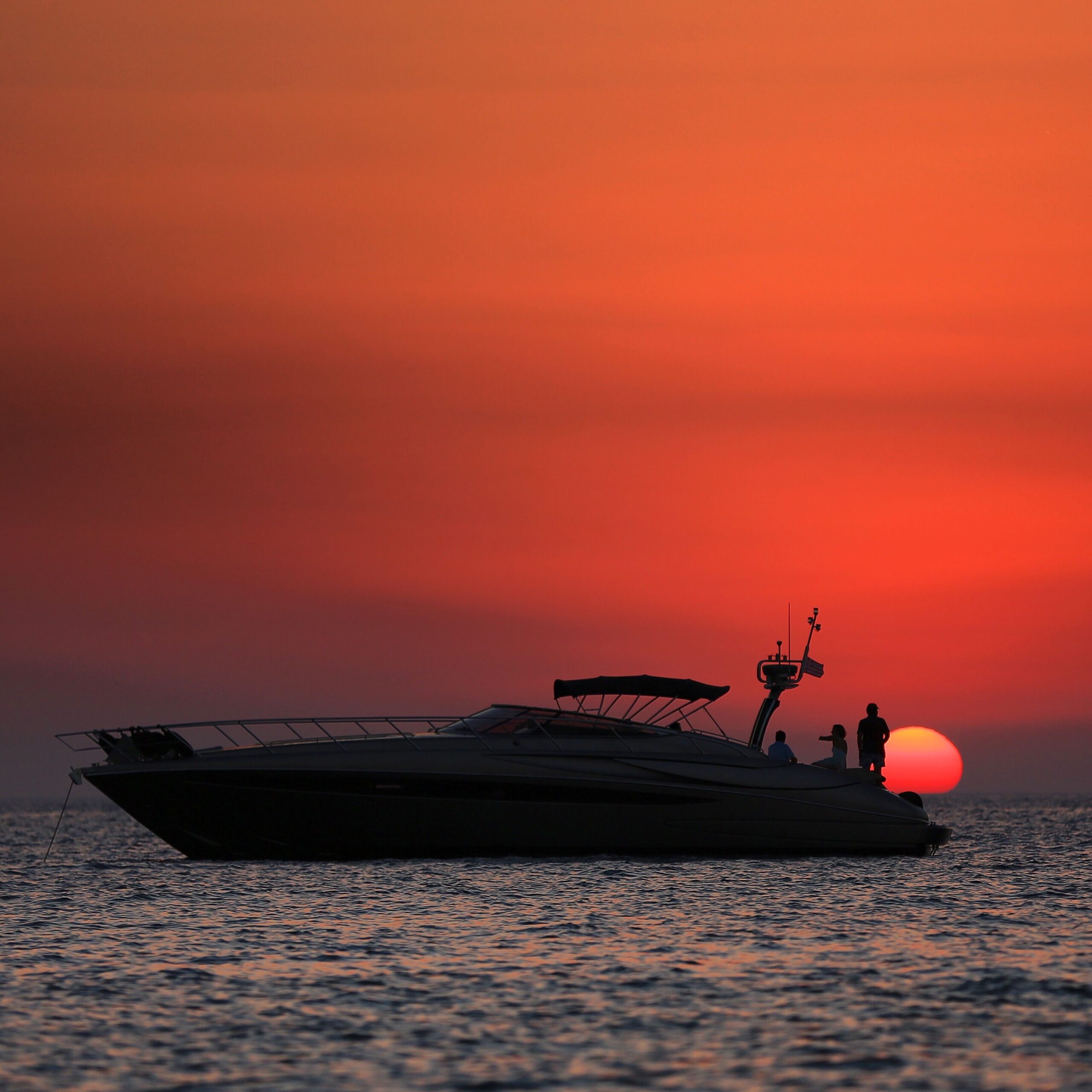 Business owners enjoying a sunset from a Yacht